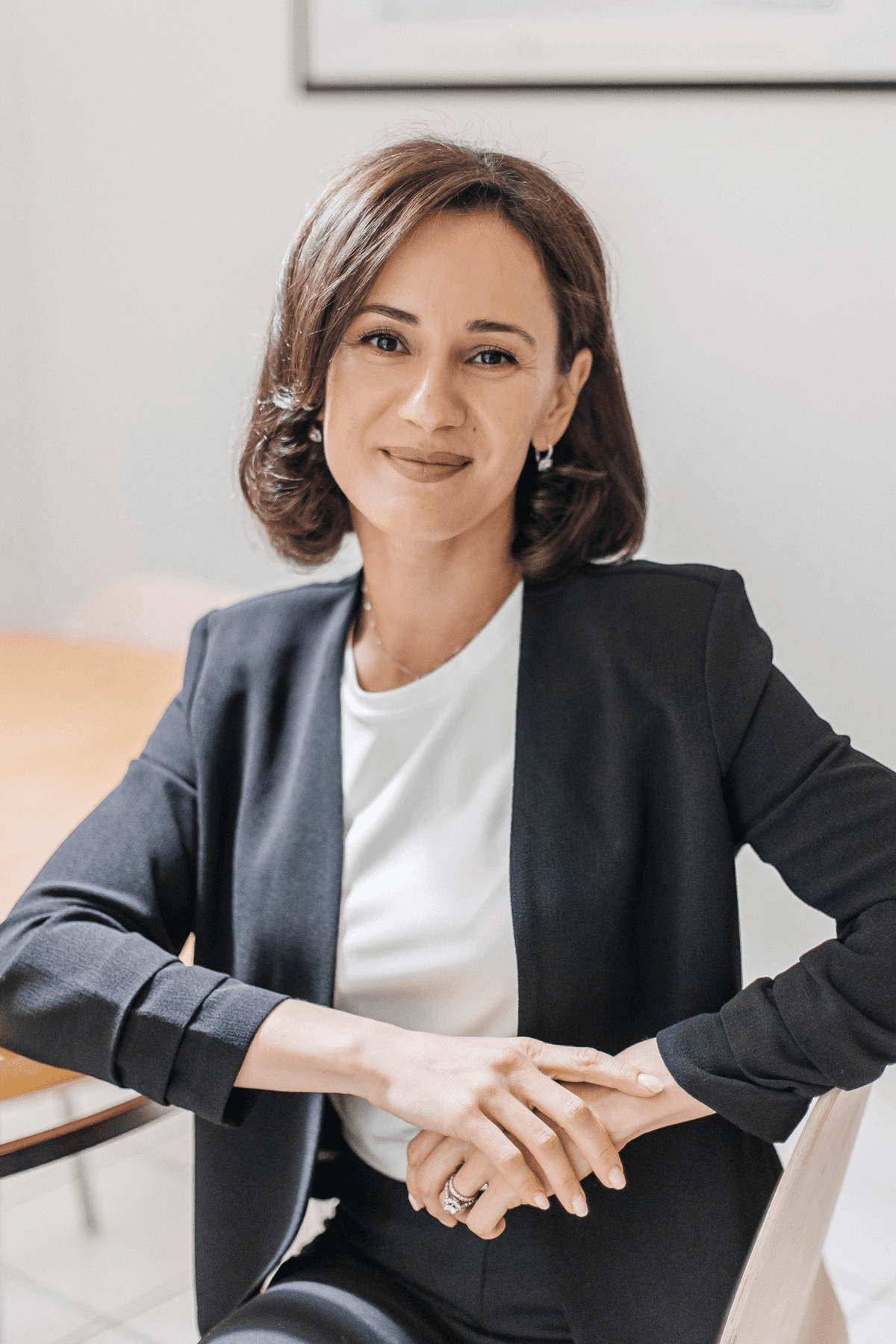 Lina Budilov seated for a professional portrait